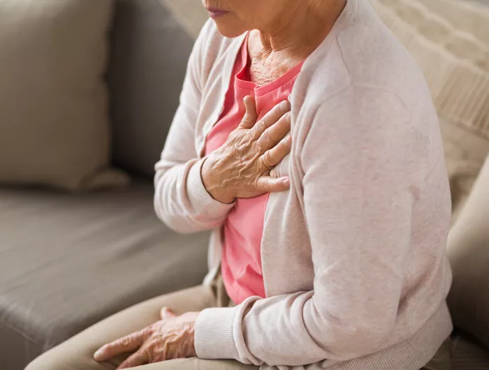 lady having chest pain